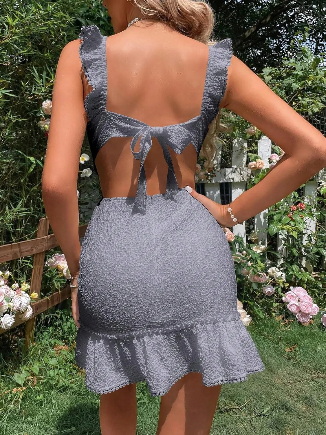 WDIRARA Women's Boho Backless Knot Ruffle Hem High Waist Trim Textured Mini Dress